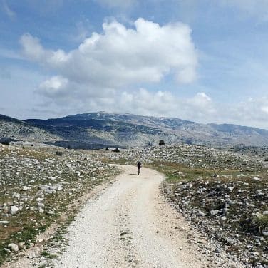 cyclist with mountain landscape
